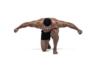 Muscular man flexing for camera