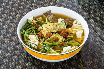 Thai Famous Food, Kaeng Som or Thai sour soup made of tamarind p