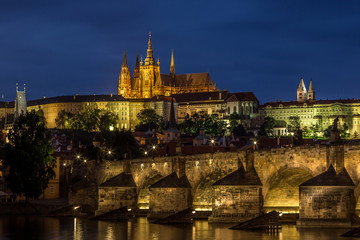  Castle and Charles Bridge by night in Prague, Czech Republic