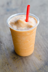 Ice red tea on wooden table