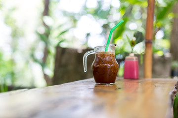ice coffee on table in garden