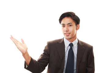 案内するビジネスマン