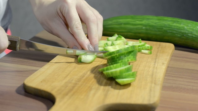 Cutting a cucumber