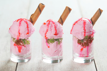 Cups of strawberry ice cream