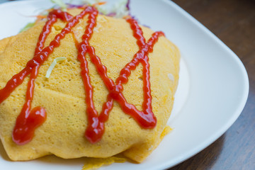 Fried rice wrapped with omelette