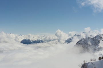 View on mountains and blue sky above clouds, Krasnaya Polyana