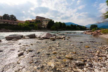 Brenta river flowing, Bassano del Grappa panorama, Italy