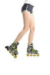 Close up  picture of woman's legs with rollerskates 