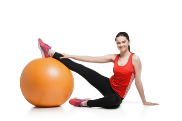 Beautiful sport woman doing  fitness exercise on ball 