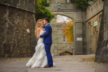 Beautiful wedding couple, happy bride and groom in nature.