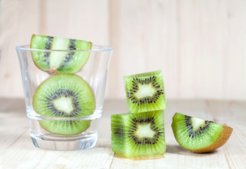 Kiwi squares on a wooden