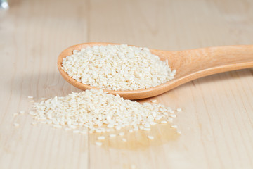 Sesame seeds in wood cup