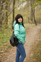 woman walking in autumn   park