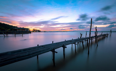 Obraz premium wooden dock with seascape in blue hour.