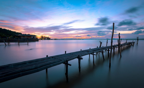 wooden dock with seascape in blue hour. © pixelshunter