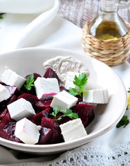 beet salad and soft cheese with olive oil and parsley
