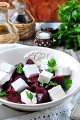 beet salad and soft cheese with olive oil and parsley