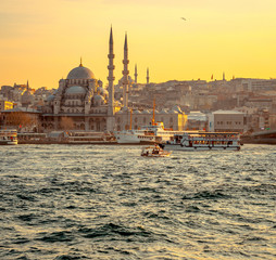 Cityscape of Istanbul at sunset with mosque.