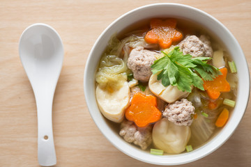 Clear Soup with Vegetables and Meatballs. Top view.