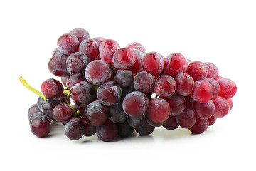 Red grapes with green leaves