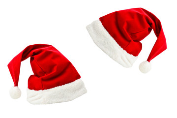 Obraz na płótnie Canvas Santa Claus hats isolated on white background