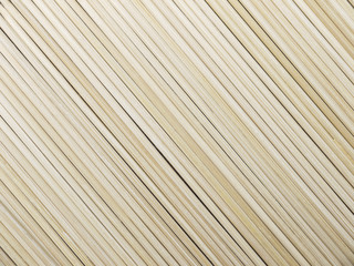 pile of wooden bamboo skewers background