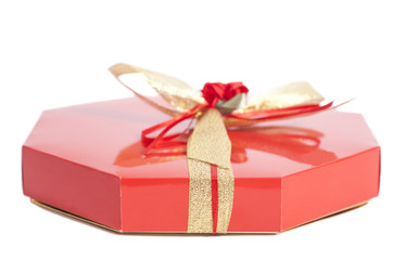 Red Box with candies and gold ribbon bow