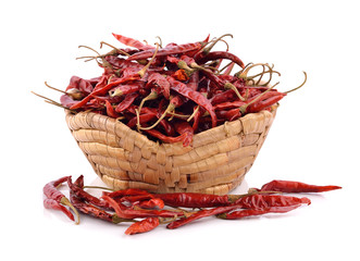 dried chili in the basket on white background