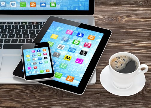Laptop, phone, tablet pc and coffee.