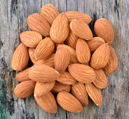 almonds on old wood background