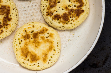 Pancakes four pieces in a pan