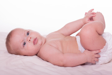 Cute happy baby in diaper