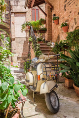 Vintage scooter on the beautiful porch in italy