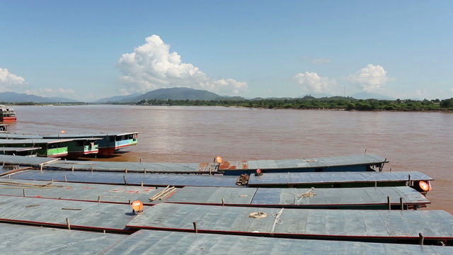 Laos and Chinese cargo boats in Mekong river at Chiang saen dock ,Thailand.