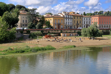Beach on the river bank Arno River. Florence, Italy