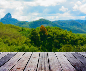 Naklejka na ściany i meble Blurred landscape with wood terrace 