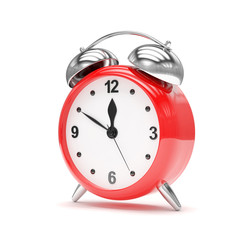 red alarm clock on white