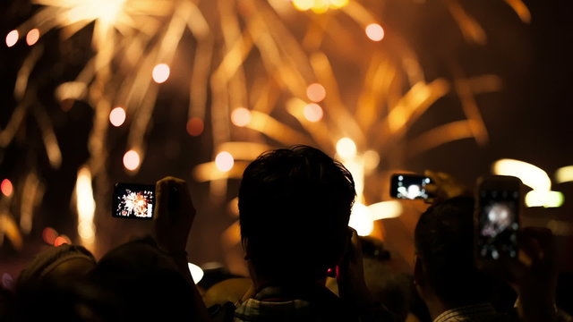 Watching Fireworks silhouetted crowd. Holiday backgrounds.