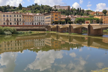 Fototapeta na wymiar Cityscape, bridge Ponte alle Grazie over Arno River in Florence