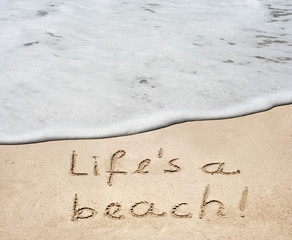Conceptual life is a beach text in sand and water