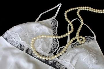 Nightdress and Pearl Necklace