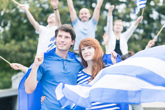 Protesters with flag of greece