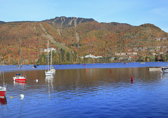 Mont Tremblant lake and village with autumn colors, Quebec, Canada