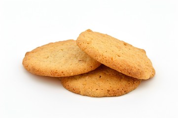 Three homemade peanut butter cookies on a white background.