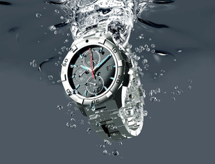wrist watch is splashing in water - obrazy, fototapety, plakaty