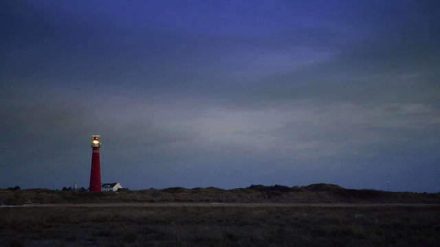 Lighthouse in the dunes at the island of Schiermonnikoog in the North of the Netherlands.