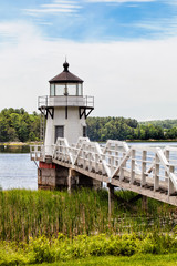 Charming small lighthouse on a river. Location: Doubling Point on Kennebec River in Maine, USA