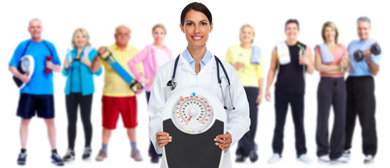 Obraz premium Medical doctor woman with scales.