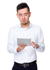 Asian Businessman use of the tablet pc