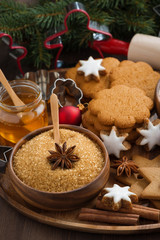 Fototapeta na wymiar Christmas cookies and ingredients for baking, vertical